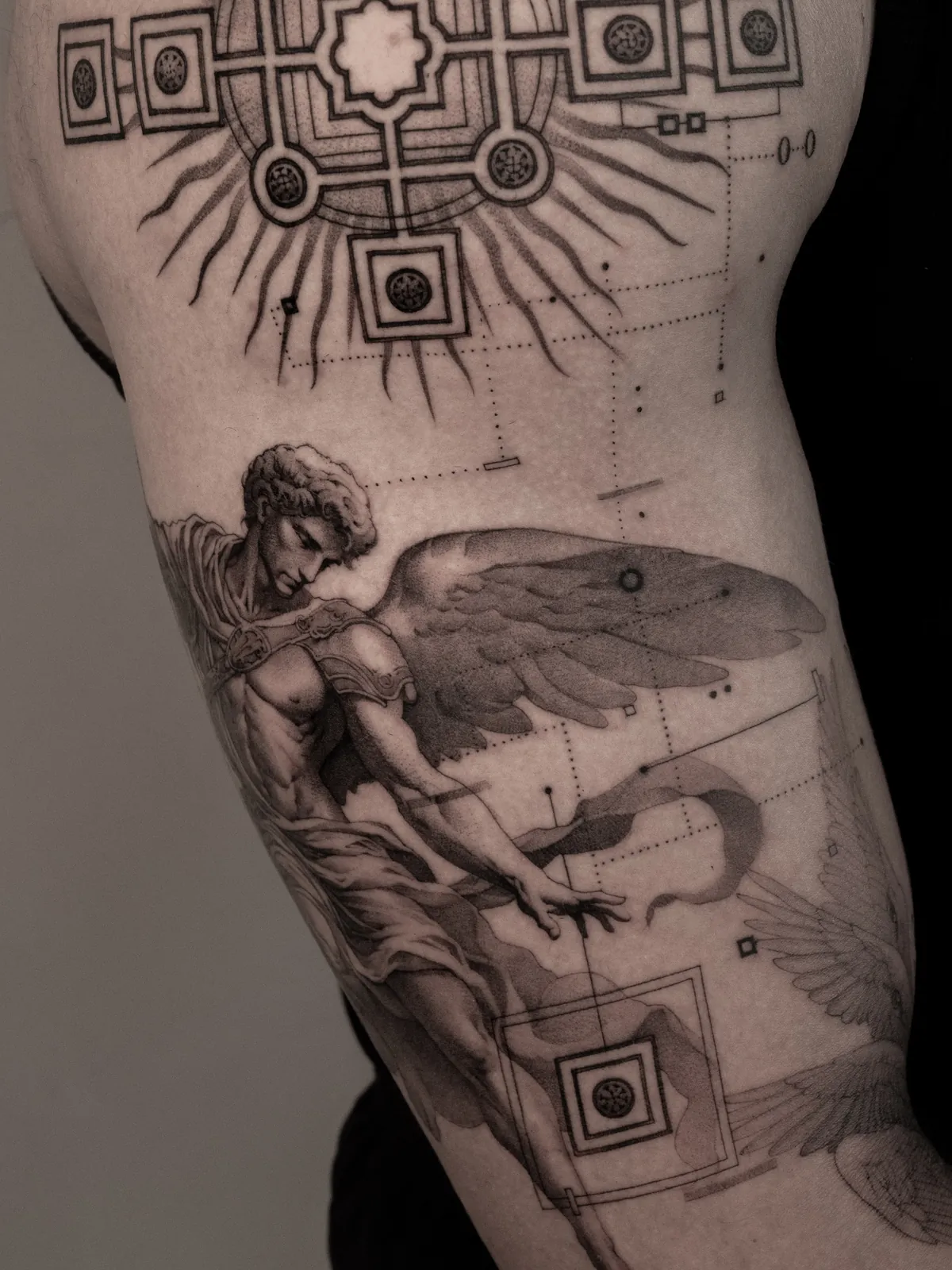 Archangel & Mandala — tattoo by Ted Faulmann